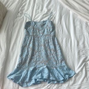 Blue laced mini dress.